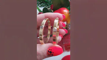 Роскошные золотые серьги конго Cartier 585 пробы,белое с желтым золото