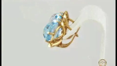 Золотые серьги с топазом
