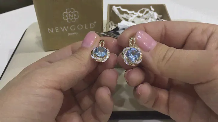 Серьги 3055 из красного золота 585 пробы с топазами sky и фианитами